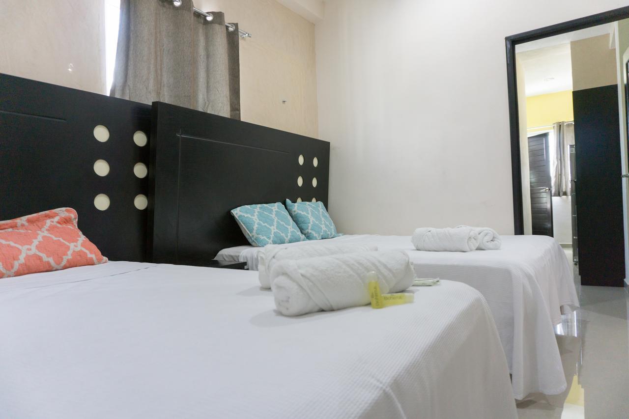 Hotel Suites La Roca Канкун Экстерьер фото